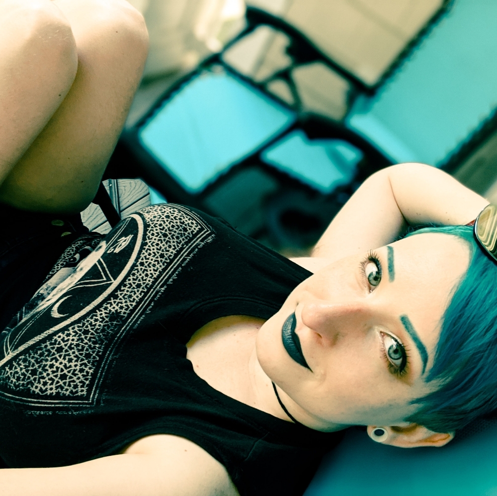 Who is this blue haired creep?